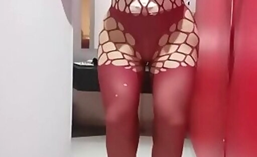 Sexy crossdresser in red bodystockings
