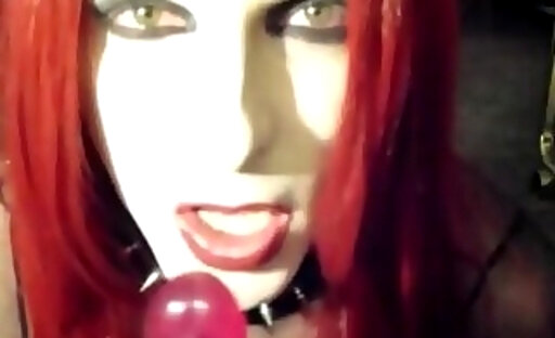 Gothic redhead tranny shows her amazing body