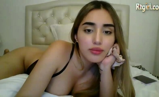 pretty latina tgirl in black lingerie strokes her cock on webcam
