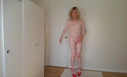 White lace bodystocking and red high heels