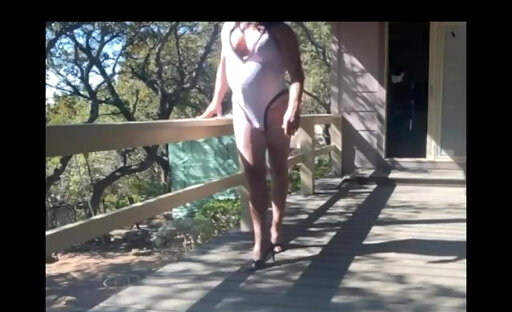 Tina Posing in White One Piece Swimsuit