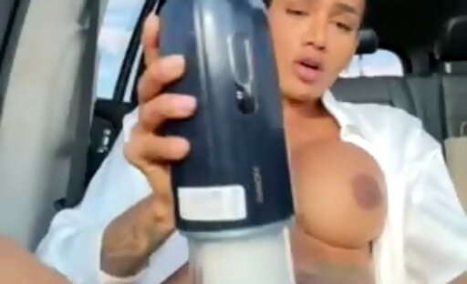 Tatted-up tranny with a mighty cock misbehaving solo in a goddamn jalopy. Buckle up, fuckers