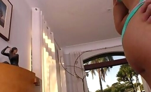 Brazilian TS Rayssa White pulls down her bikini bottoms to display her round rear