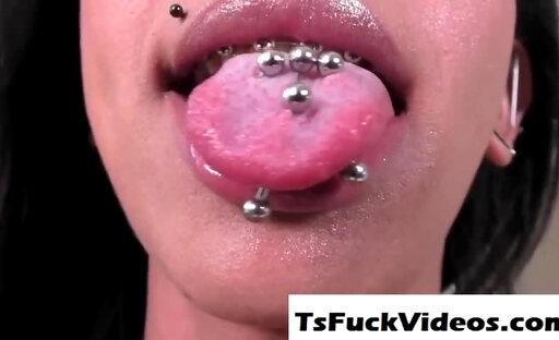 Trans Latina splashes jizz all over her huge tits
