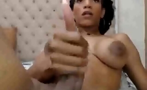 gorgeous blk tranny stroking her cock