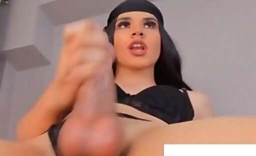 shemale with stroking her large stiff penis
