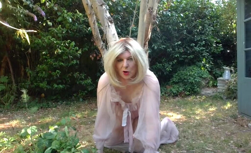 Wearing my see-through gown in the garden