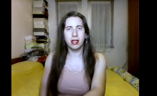 Shemale Chiara Galli cums while watching lesbian videos on webcam