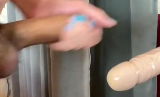 Dildo dripping in cumshot