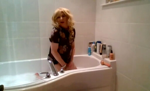 Compilation of black see-through dress, stockings and dildoing in the bath