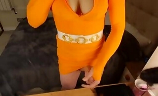 Big cock big tit TGirl Lucy wanking and cumming in orange jersey dress