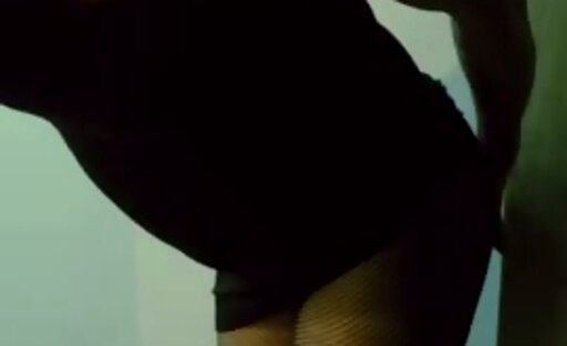 Sexy Blonde Crossdresser Black Mini Skirt Fishnet