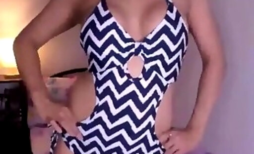 Asian trans strips bikini and jerks off on camera