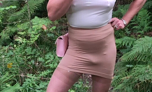 Holly's got a skirt bulge in the forest