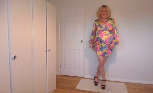 Short summer dress, nude pantyhose and black high heels