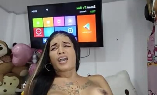 Tattooed Latina shemale cum