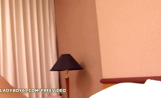 Slender ladyboy with high heels strokes her small dick in bedroom