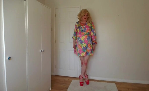 Blonde in flowery summer dress, high heels and no panties