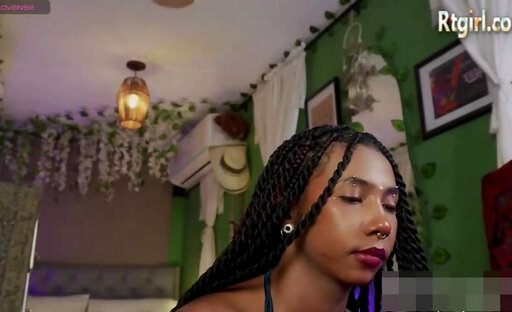 long haired slim colombian black transgirl with tattoos and piercings wanks on webcam