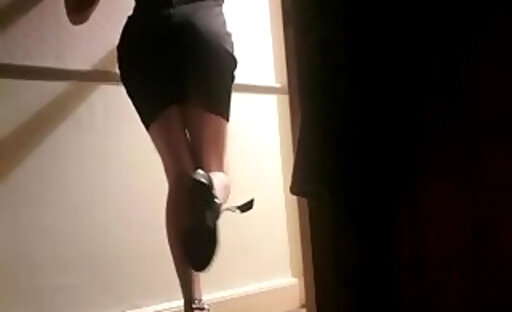 Skinny sissy in tight black dress and heels
