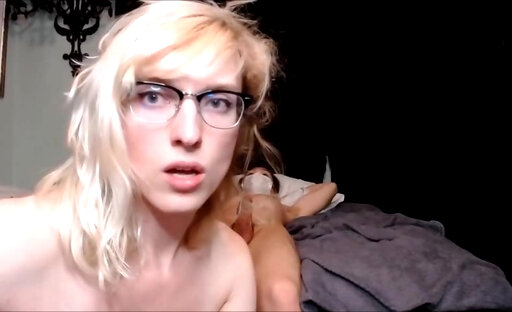 Nerdy blond ts in glasses bounces on cock while jerking off