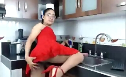 large cock tranny stroking in red dress