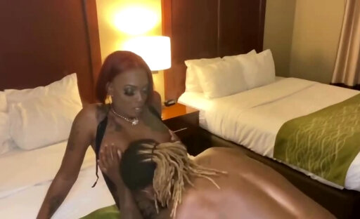 Passionate session with a redhead black ts leads to rimjob