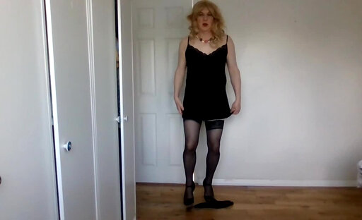 Undressing from black stockings and lacy negligee