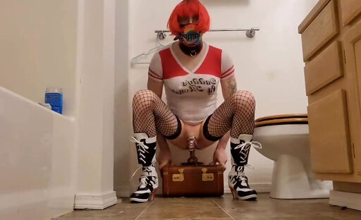 Cosplay Sissy in chastity riding her dildo