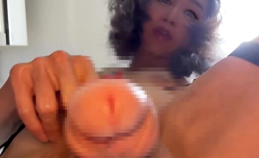 Shemale cums while inserting dildo in nurse costume