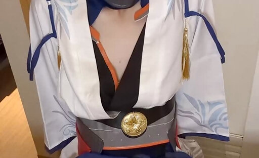 Cosplayer with a plug inserted