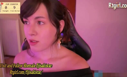 brunette trans cutie in black fishnet stockings strokes her nice cock