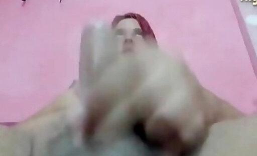redhead latina transgirl tugs her small cock on webcam