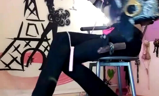 A French Shemale Bombshell Does a Live Striptease