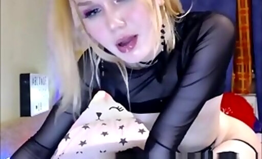 Blond shemale cries as she is stuffing her ass and mouth with her dildo
