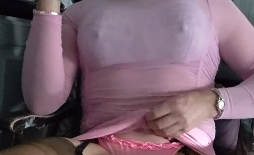Tranny Holly smoking in the pink