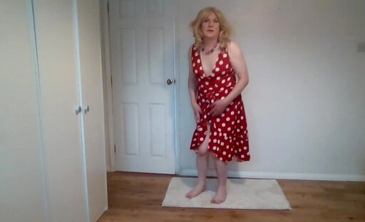Blonde in a red polka dress and no panties
