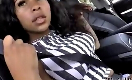 ebony shemale with fake boobs is playing with her cock