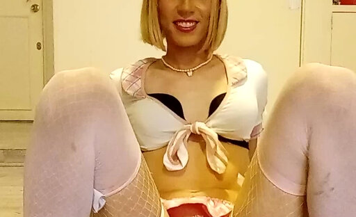 Hot sissy in chastity playing with huge dildo