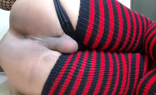Trans slut plays with her big tits and masturbates her tiny cock. No penetration.