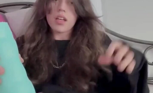 femboy playing with toy