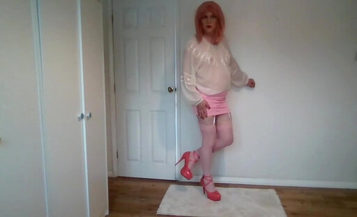 Taking my miniskirt off in pink stockings and heels