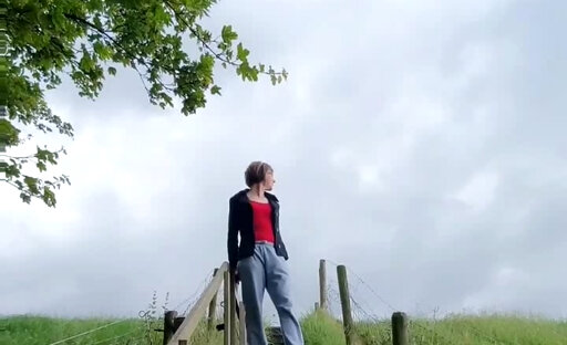 Annemieke wetting herself on her hike and caught playing on a bench outdoor
