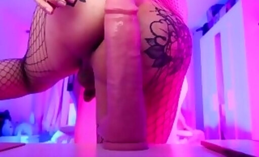 Fishnets,huge dildo and anal inflation