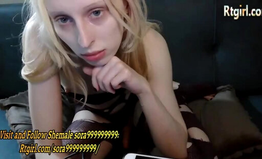 skinny Russian blonde shemale cutie in stockings and lingerie strokes her small dick