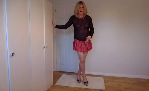 Naughtry short skirt, high heels and pantyhose