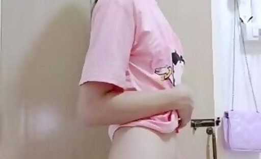 Ladyboy Lily Showing Her Cock off in Cute Pink Top