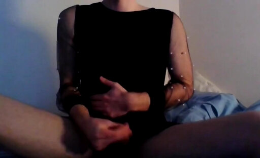 Adorable crossdresser stepping out in a stylish little black dress