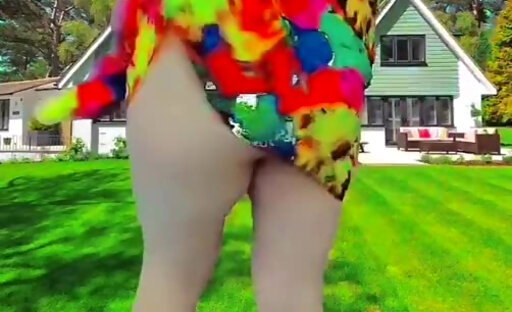 Playful femboy teasing with skirt in windy street