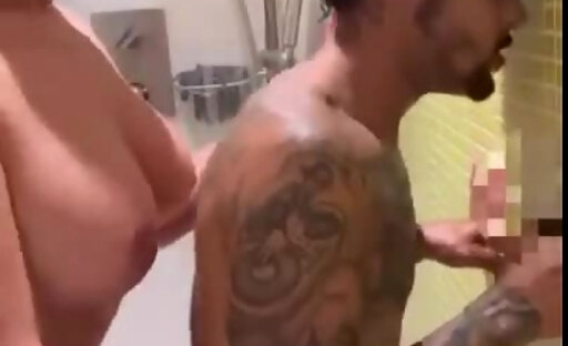 Busty Ts start fucking him in the shower and finishes in the bed